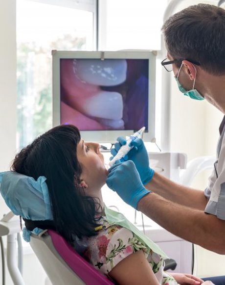 Patient in Marysville talking with dentist about gum disease