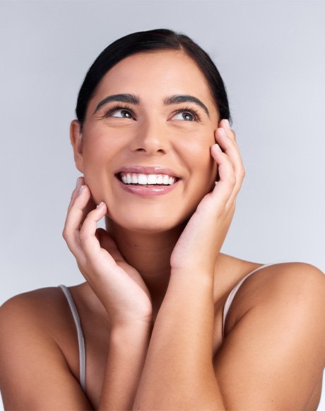 Smiling woman with beautiful, glowing complexion